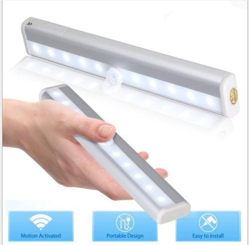 LED sensor light with motion activation, portable design, easy to install for cabinets and other spaces.
