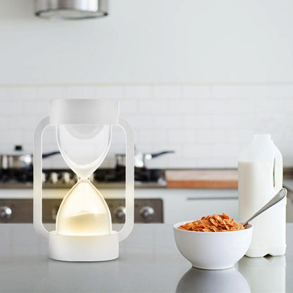 Led sensing hourglass sleeping light