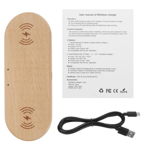 Wooden wireless charger made of bamboo with user manual and USB cable for smartphones.