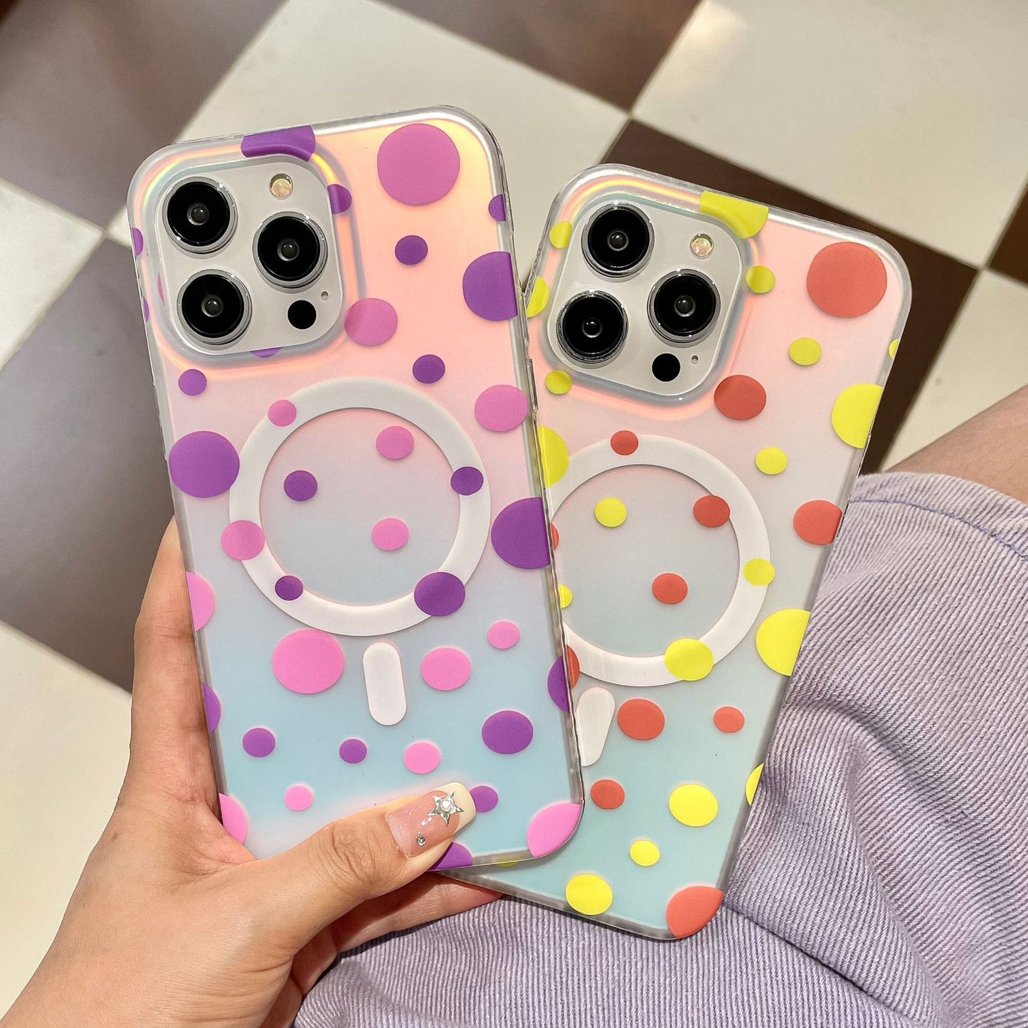 Magnetic phone case featuring cute polka dots in rainbow colors for Apple devices, providing fall protection and style.