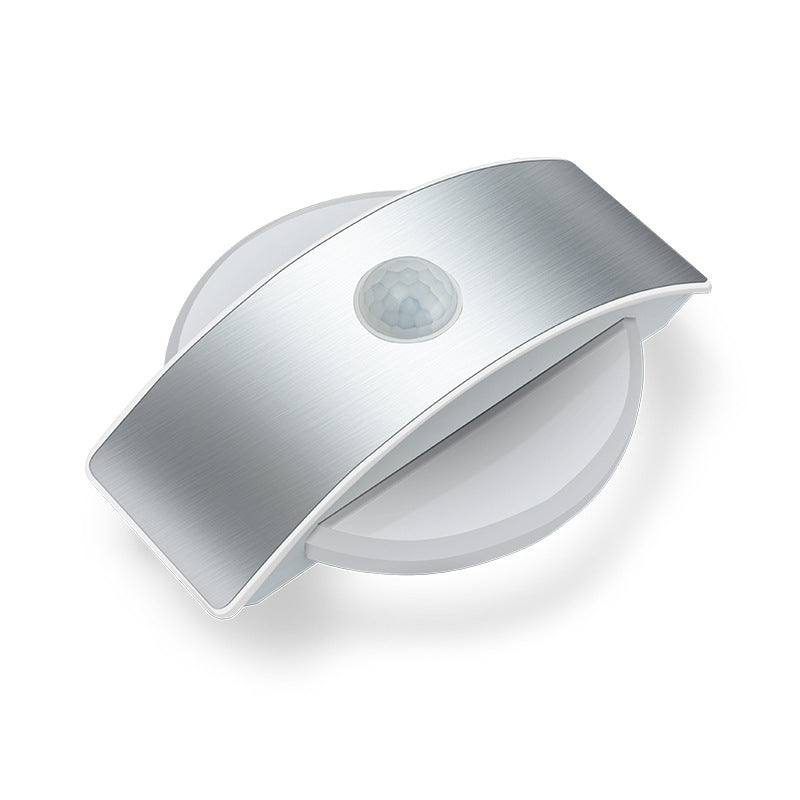 Sensor LED Night Light - Warm & White Induction Light, sleek design with motion sensor, ideal for home use.