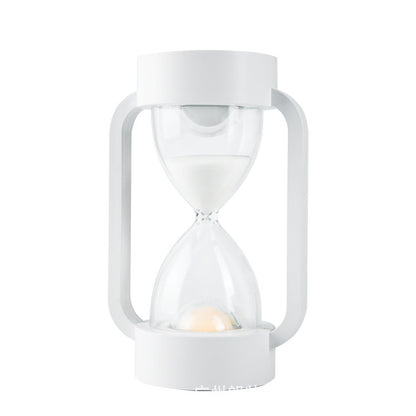 Led sensing hourglass sleeping light
