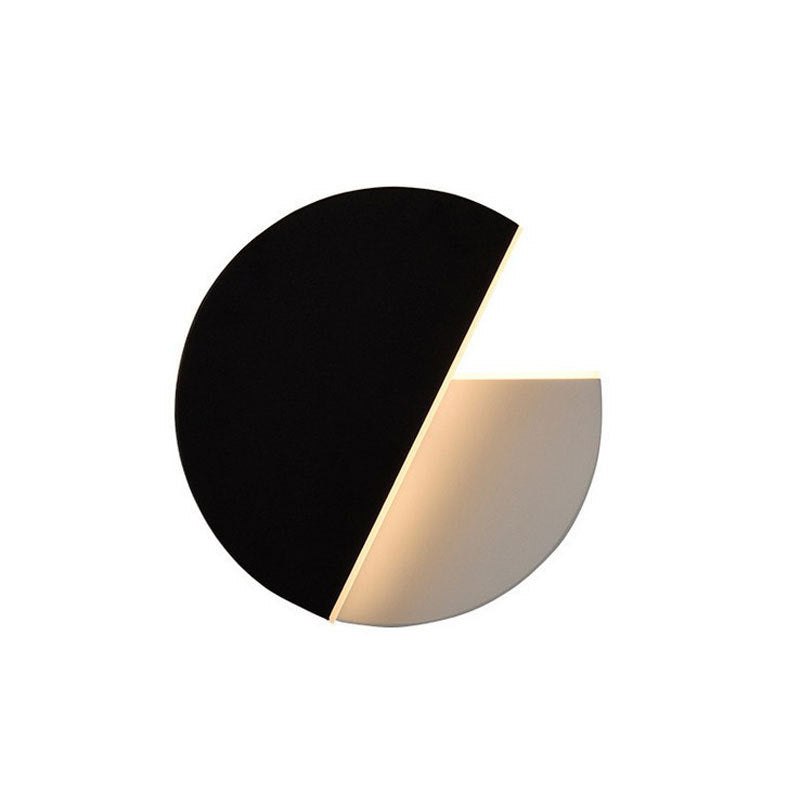 Rotating round LED wall light