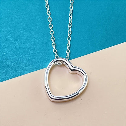 Heart Necklace for Women on a chain, showcasing a stylish heart design, perfect for modern and classic fashion.