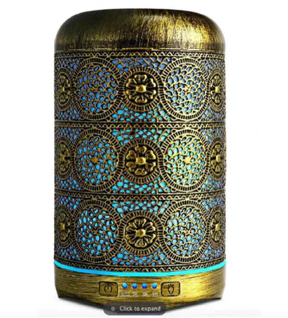 Portable air purifier in an intricately designed bronze and blue pattern, perfect for any room.
