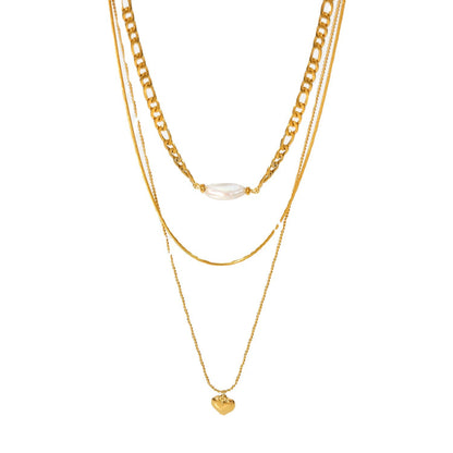 Pearl heart-shaped necklace for women, featuring a lustrous pearl centerpiece and a delicate heart pendant.