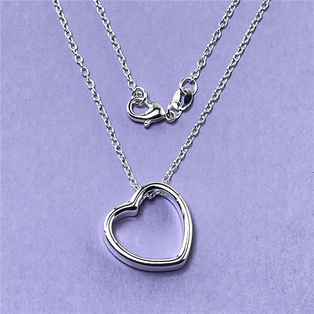 Heart Necklace for Women, silver chain with open heart pendant, stylish and elegant fashion jewelry.