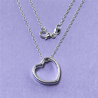 Heart Necklace for Women, silver chain with open heart pendant, stylish and elegant fashion jewelry.