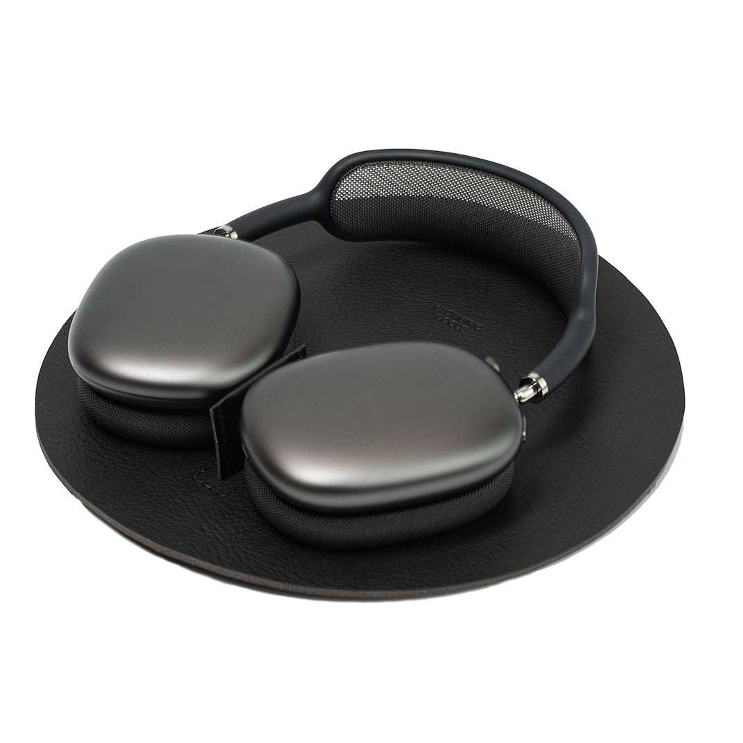 Black full-grain Italian leather AirPods Max rest station with smooth surface and charging channel