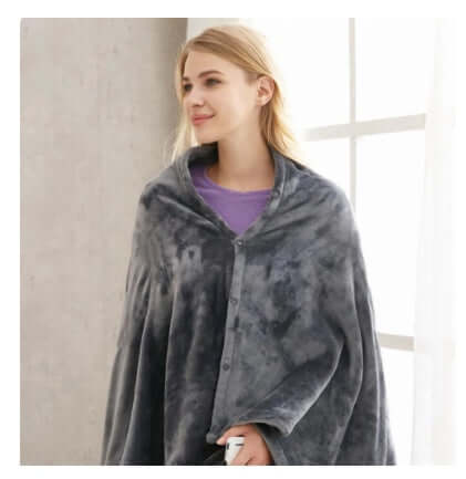 Electric Heated Plush Blanket - Soft & USB Compatible worn by a smiling woman in a cozy gray shawl garment.