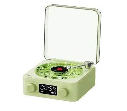 Compact retro portable turntable bluetooth speaker with nature sounds and 360° audio.