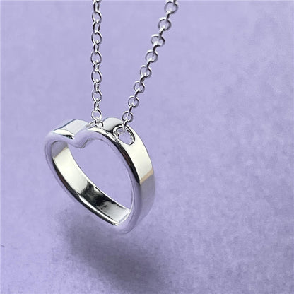 Heart necklace for women showcasing modern fashion and timeless elegance.