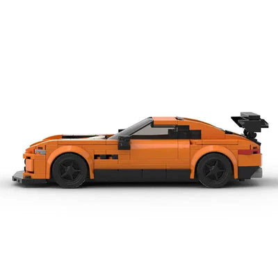 Orange Mercedes AMG GT model kit car side view building toy